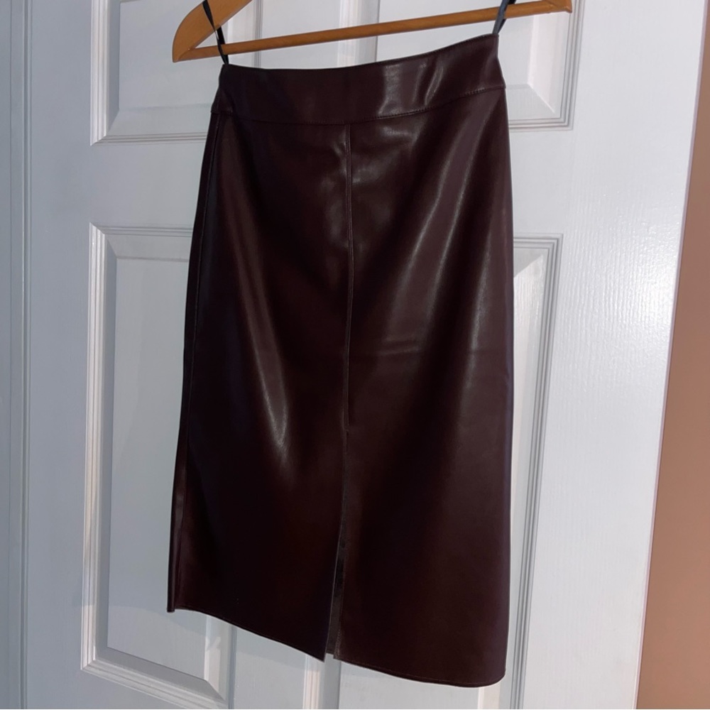 New burgundy faux leather skirt, front slit